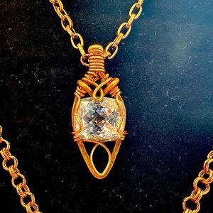 Clear Quarts Faceted gem with Copper wrapped